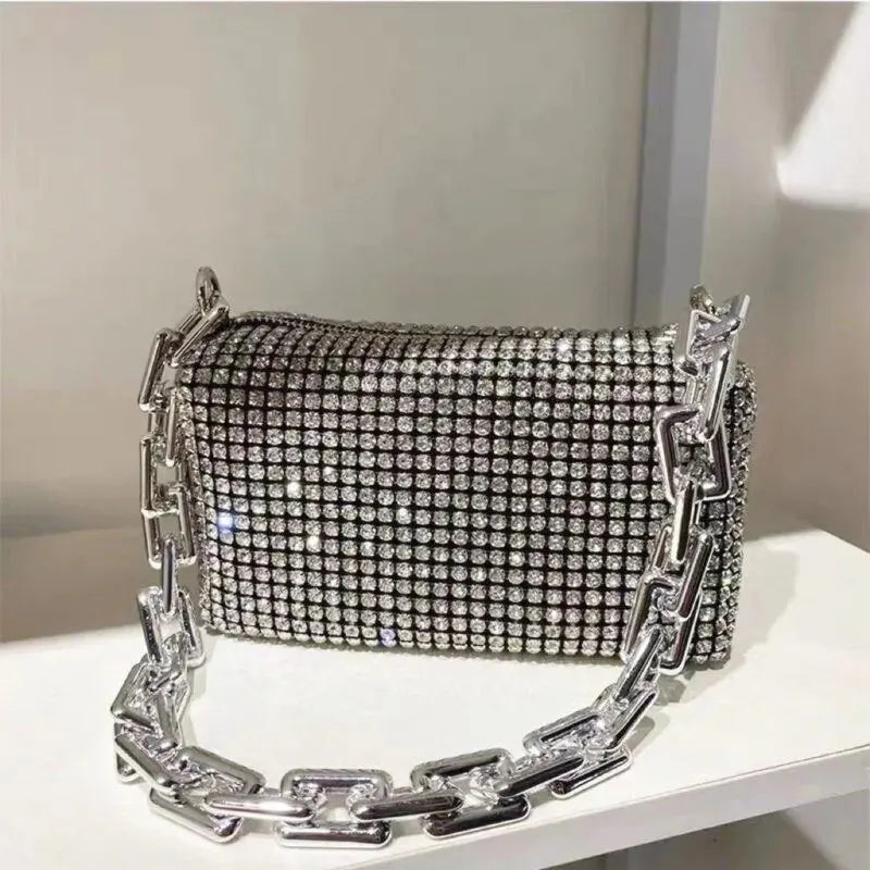 Bolso brillante de mano